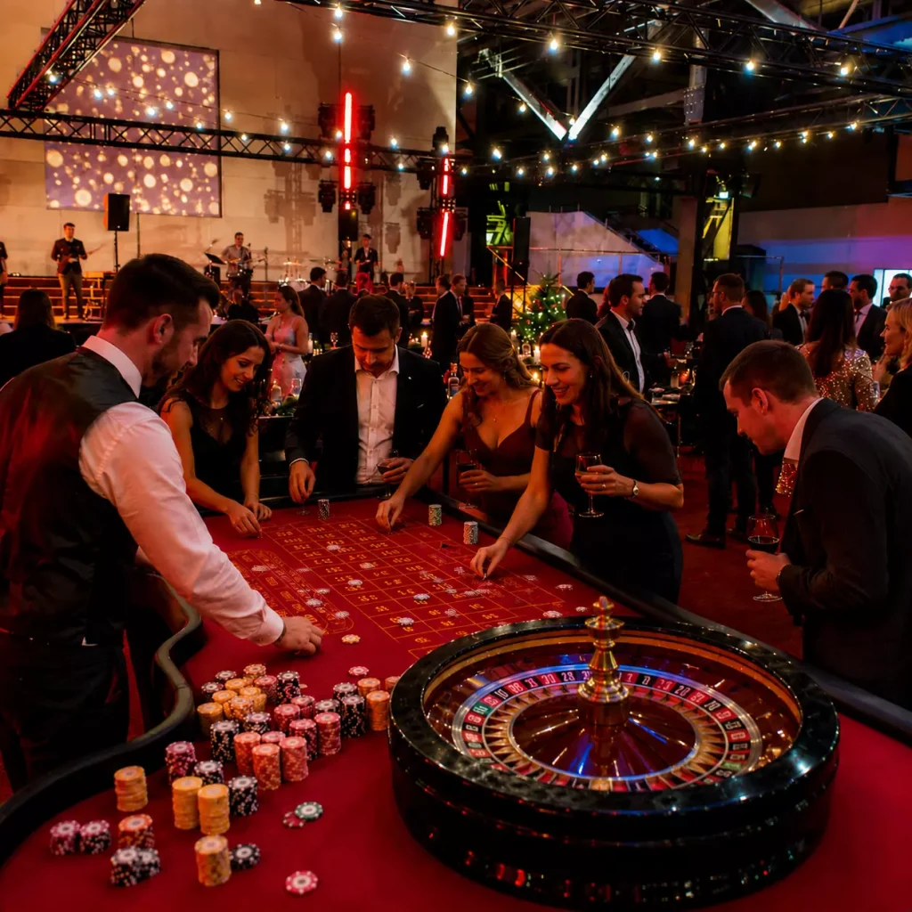 Roulette-Tisch auf einer exklusiven Firmenfeier mit Gästen, Casino-Chips und professionellem Casino-Entertainment